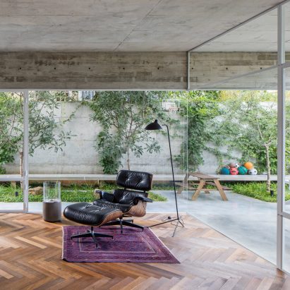 Interior of concrete house with wooden floor