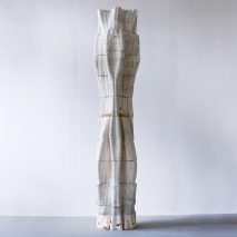 3D-printed mycelium Tree Column by Blast Studio with curvy silhouette