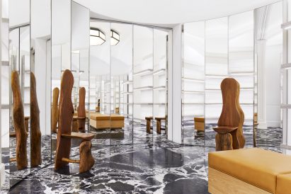 Folding mirrored screens reflect the Celine New Bond Street store