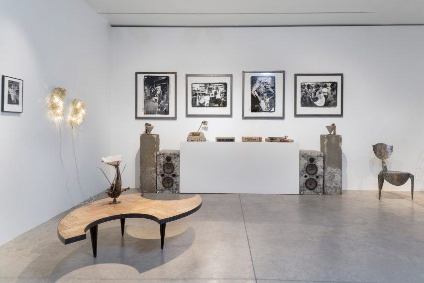 A table and other furnishings inside the exhibition Accidents Will Happen