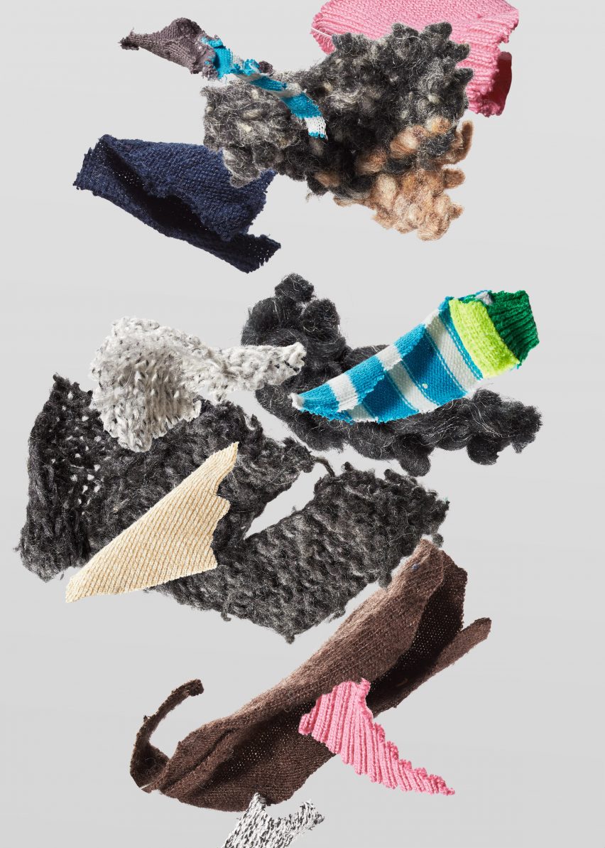 Scraps of multicoloured clothing falling through the air