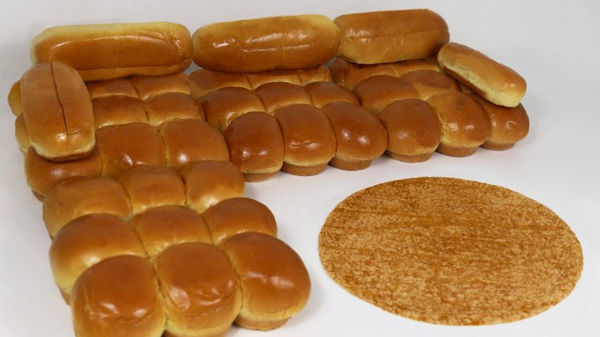Camaleonda sofa made from bread rolls in front of circular brown rug