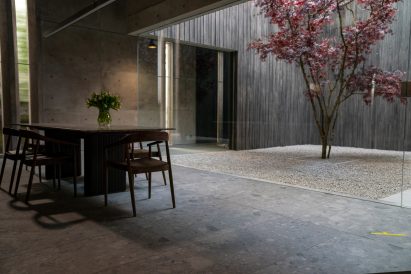 A dining room and a courtyard from The Girl Before