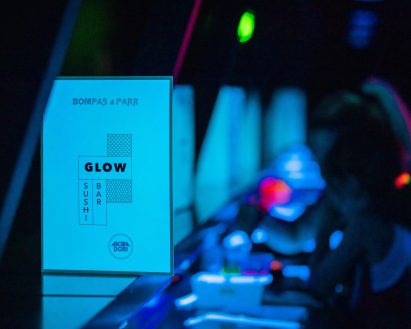 Bar and menu at Glow-in-the-Dark Sushi bar by Bompas & Parr