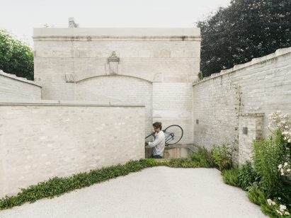 The pale stone extension blends in with the original structure