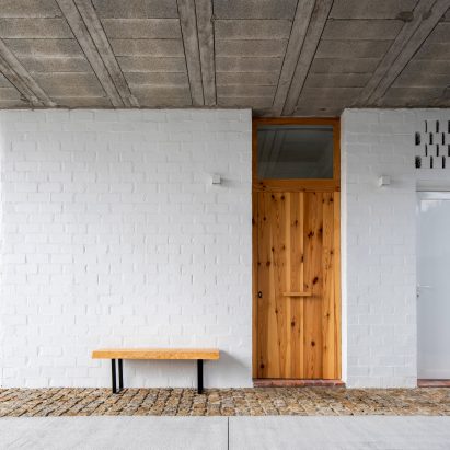 White-painted brick facade