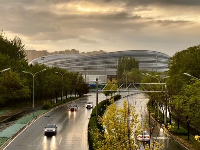Highway view of Ice Ribbon by Populous for Beijing 2022 Winter Olympics