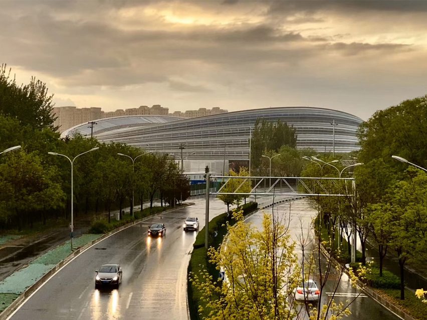 Highway view of Ice Ribbon by Populous for Beijing 2022 Winter Olympics