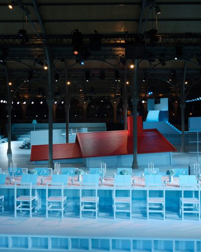 A long banquet table was placed adjacent to the sunken house at the Louis Vuitton Autumn Winter 2022 show