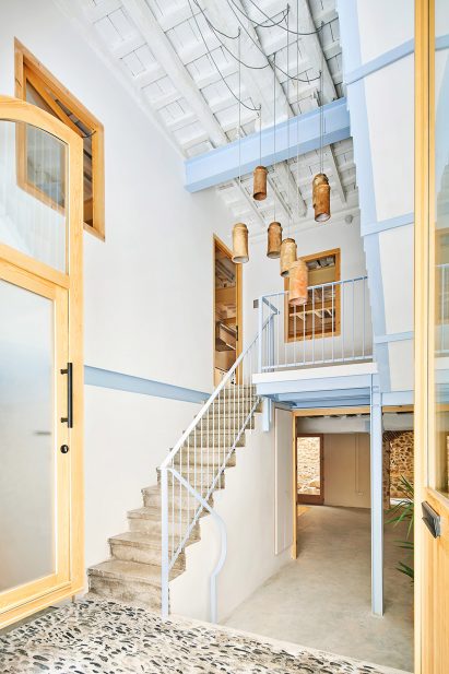 Stairwell with blue balustrades