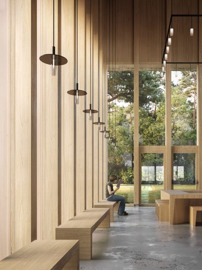 Timber foyer of the Tilburg University Lecture Hall with forest views visible through double-height windows