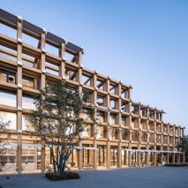 Gridded facade of Shaoxing Rice Wine Town Reception Room by Gad