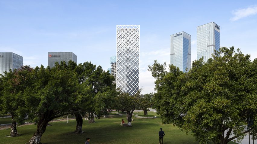 SOM's Rural Commercial Bank headquarters in Shenzhen visible through park treeline