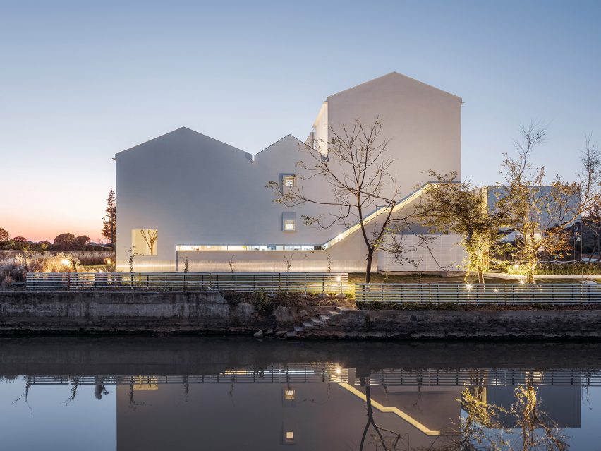 Night view of east elevation of The White Section Homestay by Wutopia Lab