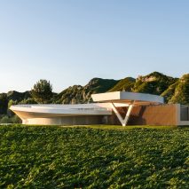 Tiangang Art Center has a timber and white painted exterior