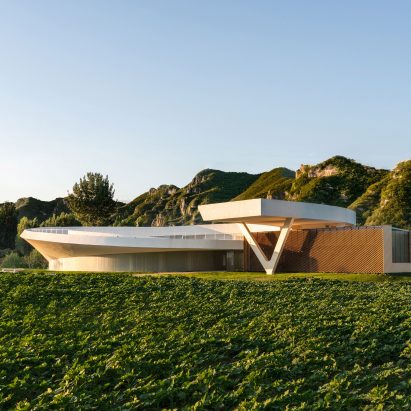 Tiangang Art Center has a timber and white painted exterior