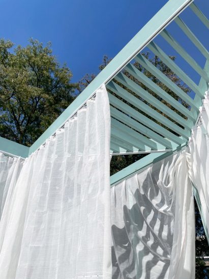 Green-painted timber pavilion