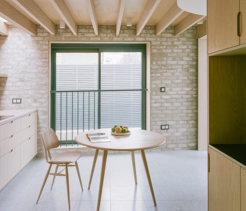 Kitchen-diner with grey-brick walls
