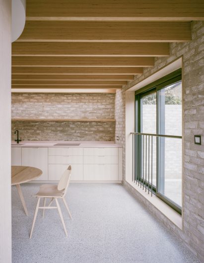 Kitchen with exposed brickwork