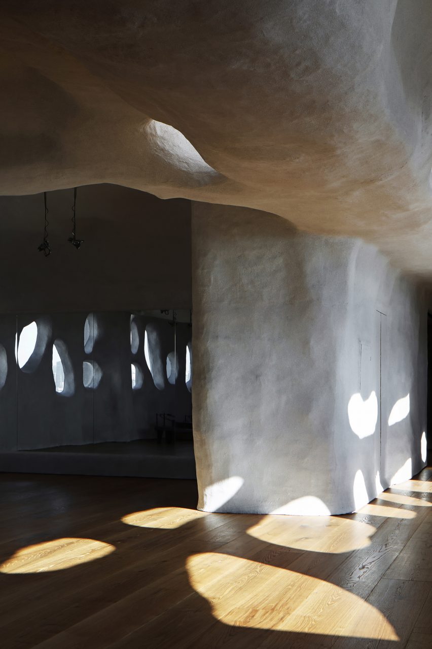 T.T. Pilates studio in Xiamen features cave-like interiors