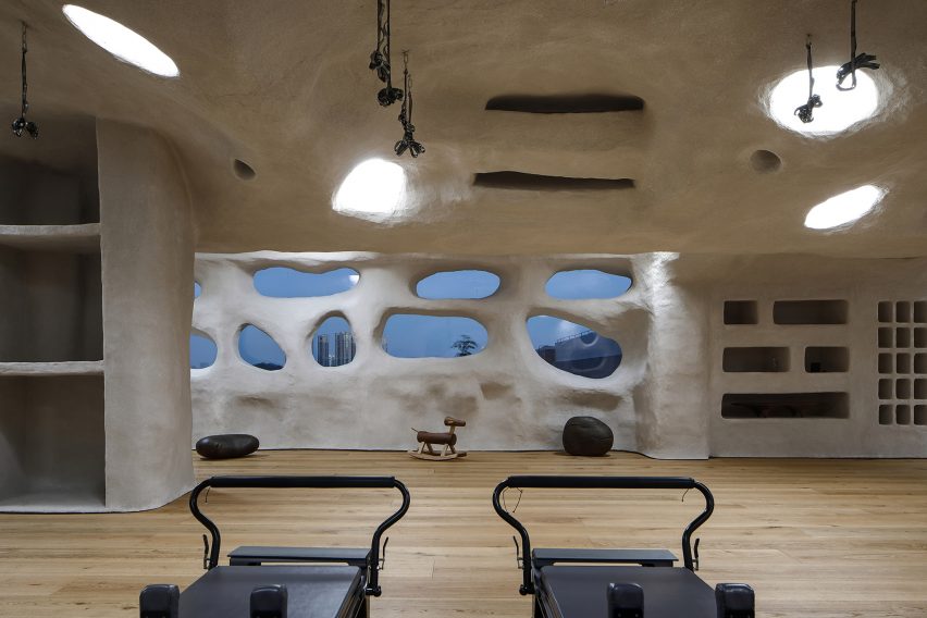 T.T. Pilates studio in Xiamen features cave-like interiors