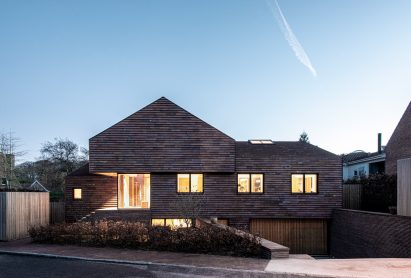 Night view of facade of Villa E by CF Møller Architects