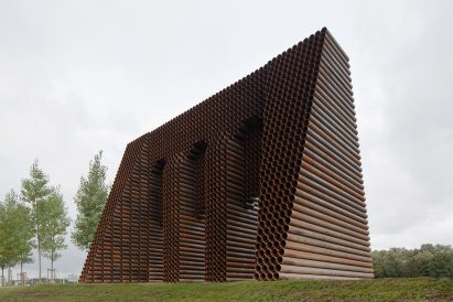 Waterline Monument stacked steel tubes are laid horizontally