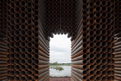 Steel tubes form arches at Waterline Monument