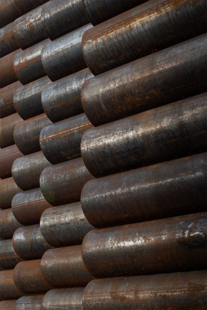 Steel tubes are stacked on top of eachother