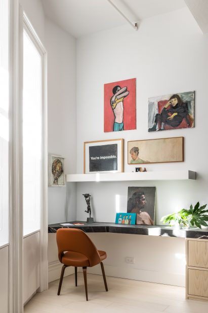 A brown chair and marble desk
