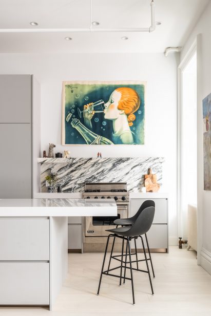 A grey toned kitchen table and stools