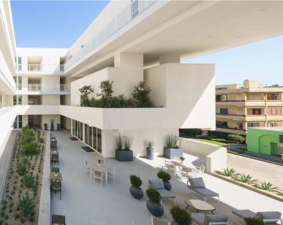 Brooks Scarpa 11 NOHO apartment building opening