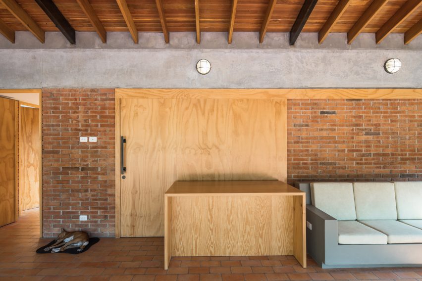 House in La Sila by PLan:b colombian home sliding wooden door