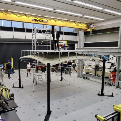 Paul Shepherd stands atop the ACORN vaulted concrete floor prototype at the University of Cambridge