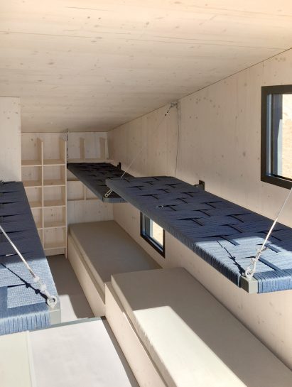 Interior image the multifunctional space at Bivacco Brédy