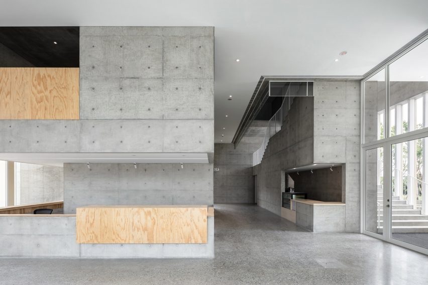 Tamkang Church is a vertical concrete church that was designed by Behet Bondzio Lin Architekten