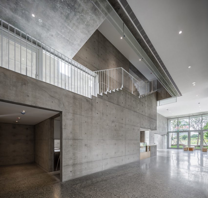 Tamkang Church is a vertical concrete church that was designed by Behet Bondzio Lin Architekten
