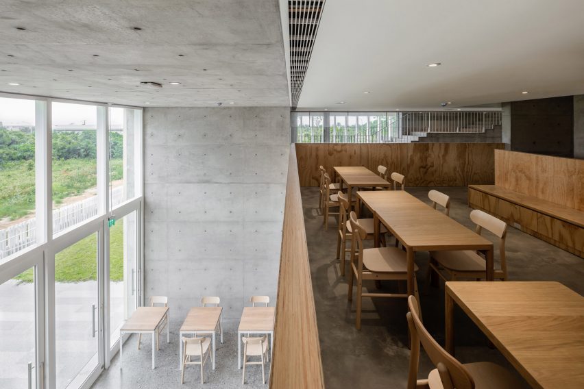 Tamkang Church is a vertical concrete church that was designed by Behet Bondzio Lin Architekten