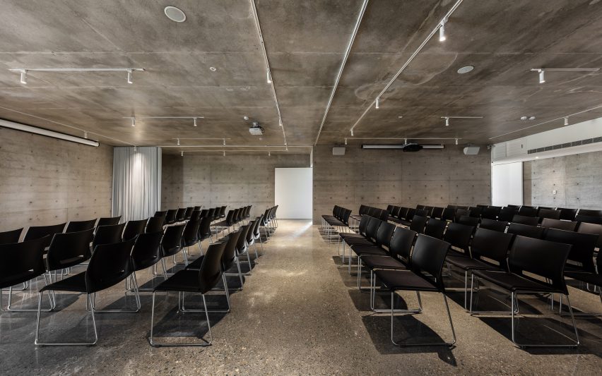 Tamkang Church is a vertical concrete church that was designed by Behet Bondzio Lin Architekten