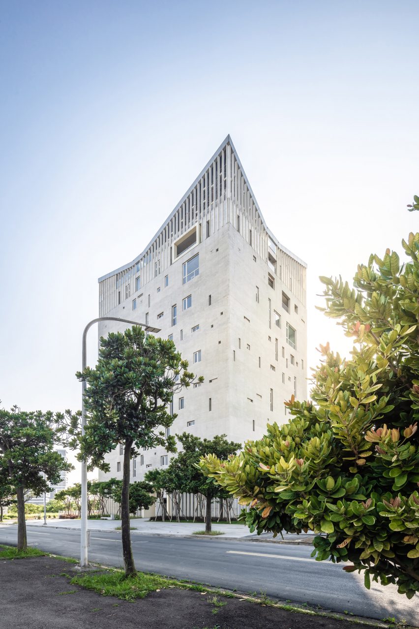 Tamkang Church is a vertical concrete church that was designed by Behet Bondzio Lin Architekten