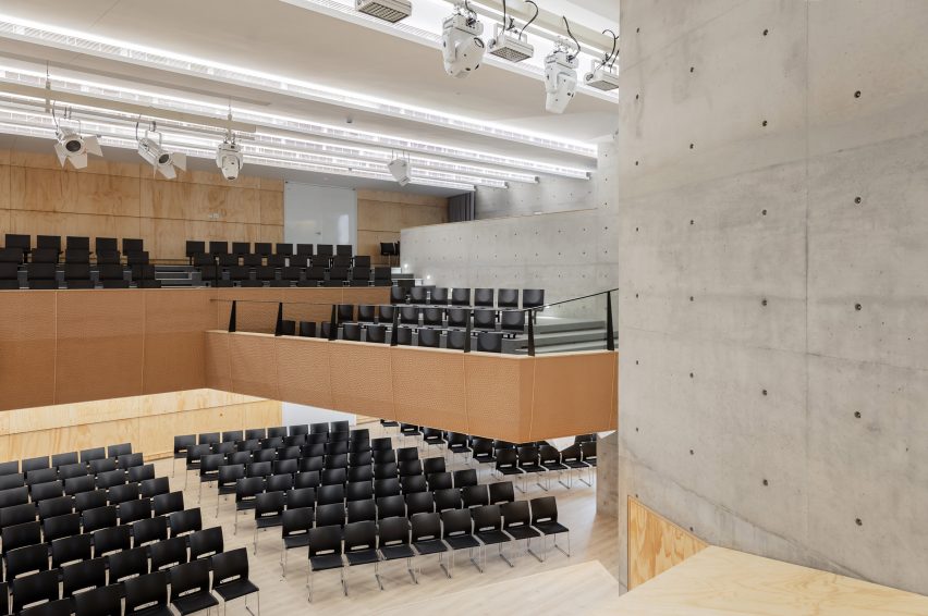 Tamkang Church is a vertical concrete church that was designed by Behet Bondzio Lin Architekten