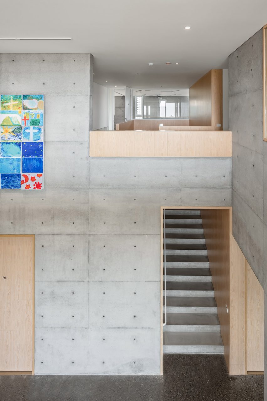 Tamkang Church is a vertical concrete church that was designed by Behet Bondzio Lin Architekten