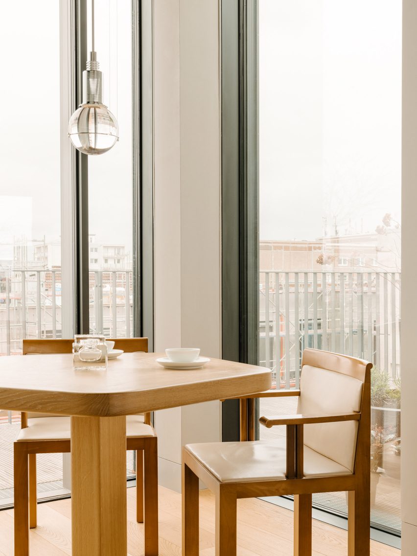 Dining room inside Berlin apartment designed by Gisbert Poppler