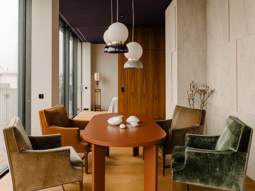 Dining room inside Berlin apartment designed by Gisbert Poppler