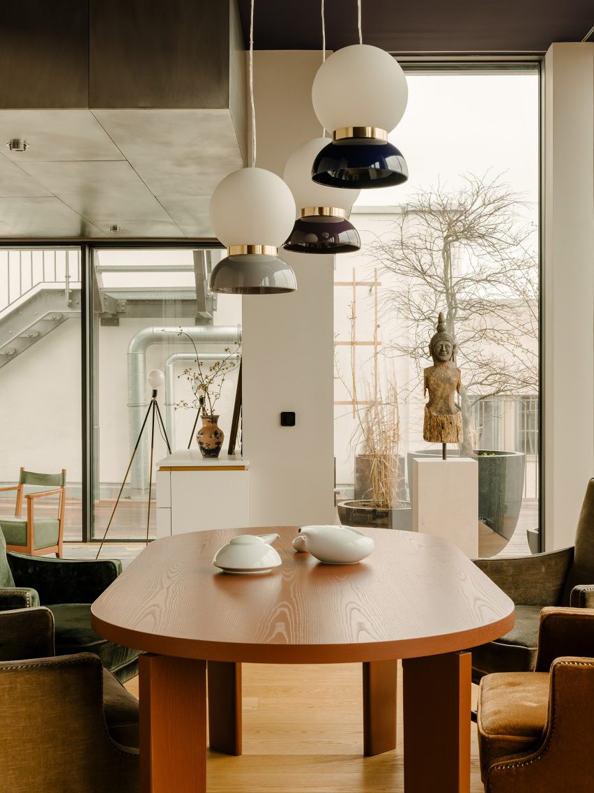 Dining room inside Berlin apartment designed by Gisbert Poppler