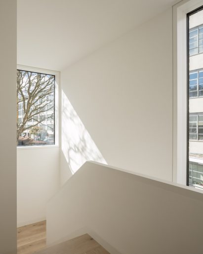 White-walled residential staircase