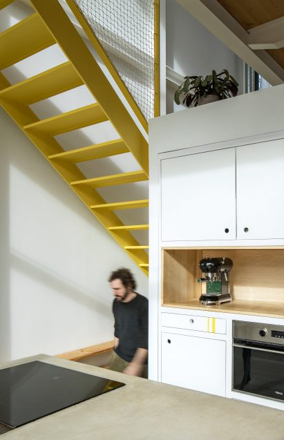 Yellow staircase at Casa Collumpio