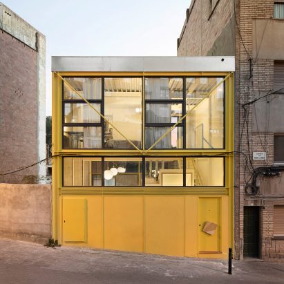 Yellow exterior of Casa Collumpio