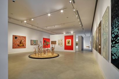 Art work is displayed in a minimal exhibition space