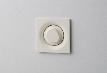 Elos light switch with an organic rounded shape